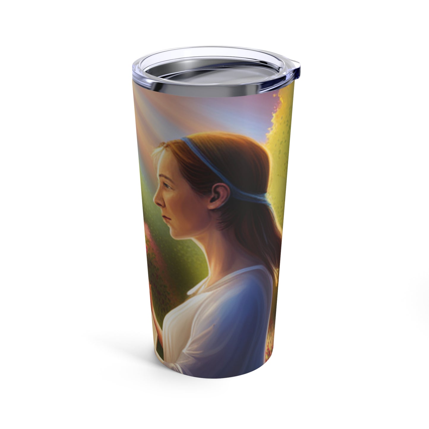 A woman standing in a park reading the bibleTumbler 20oz